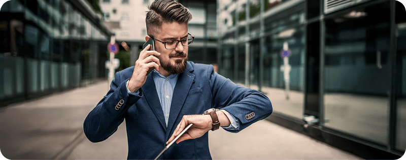 Businessman talking on phone in a modern tech environment