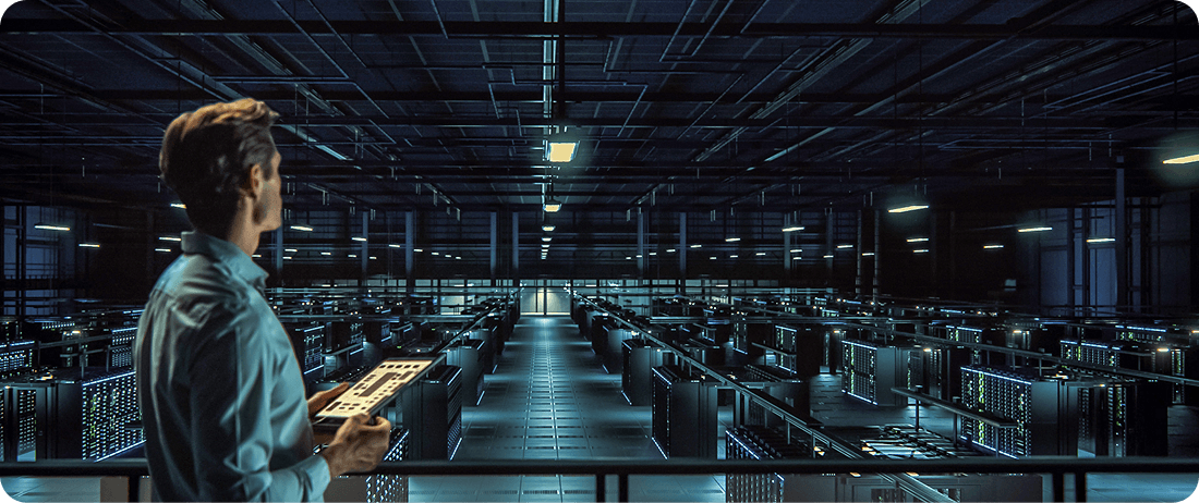 Engineer managing AI infrastructure in high-tech data center